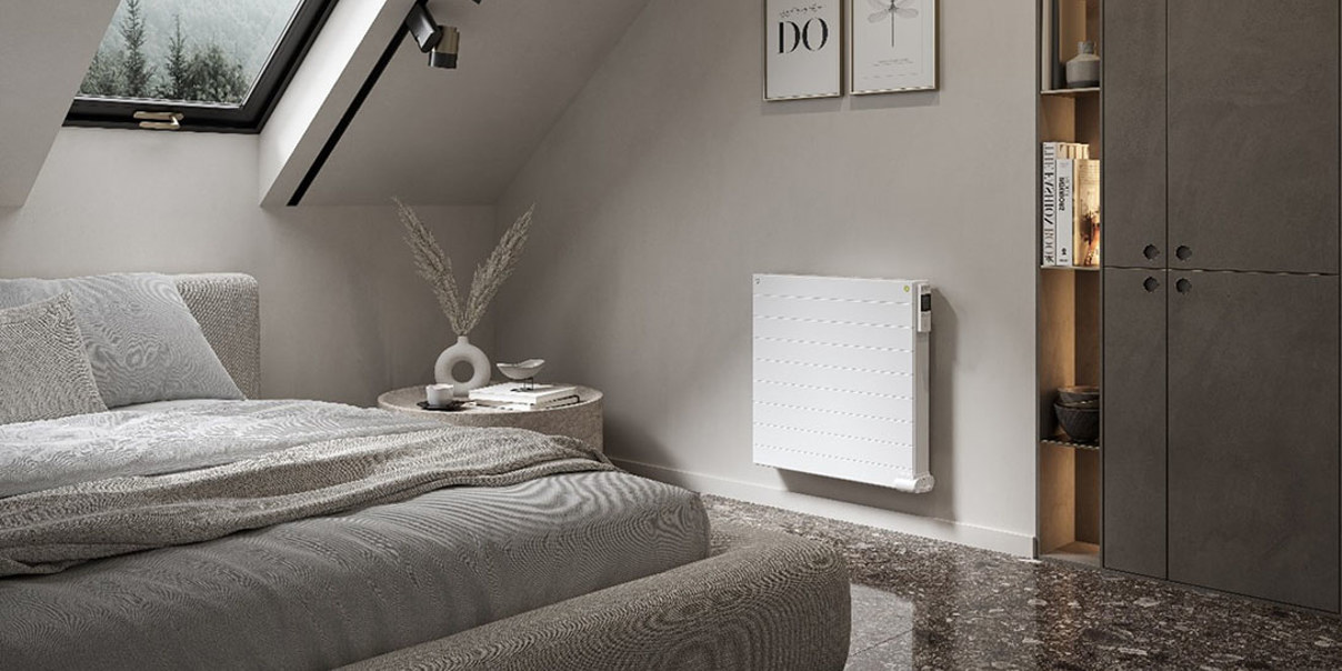 Oil-filled radiator wall-mounted in bedroom